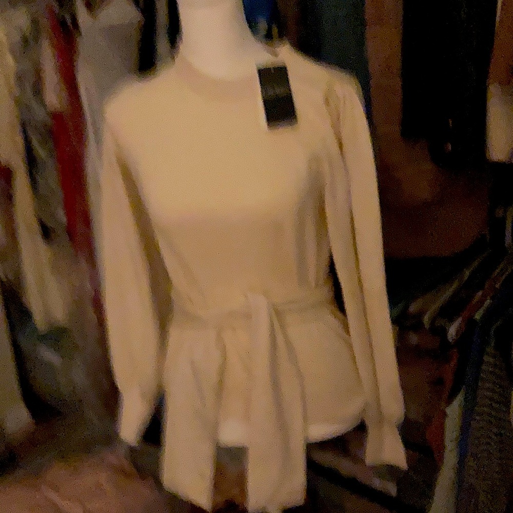 Brand new cream sweater by Ralph Lauren,size small.